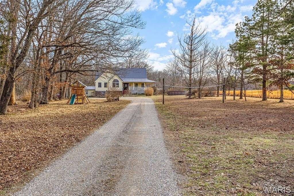 19.7 Acres of Land with Home for Sale in Farmington, Missouri