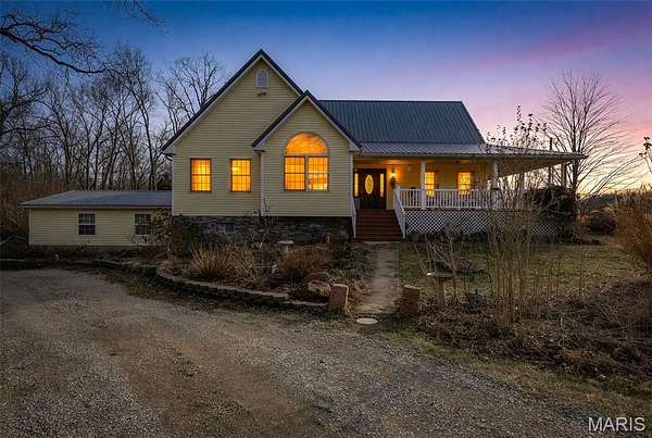 19.7 Acres of Land with Home for Sale in Farmington, Missouri