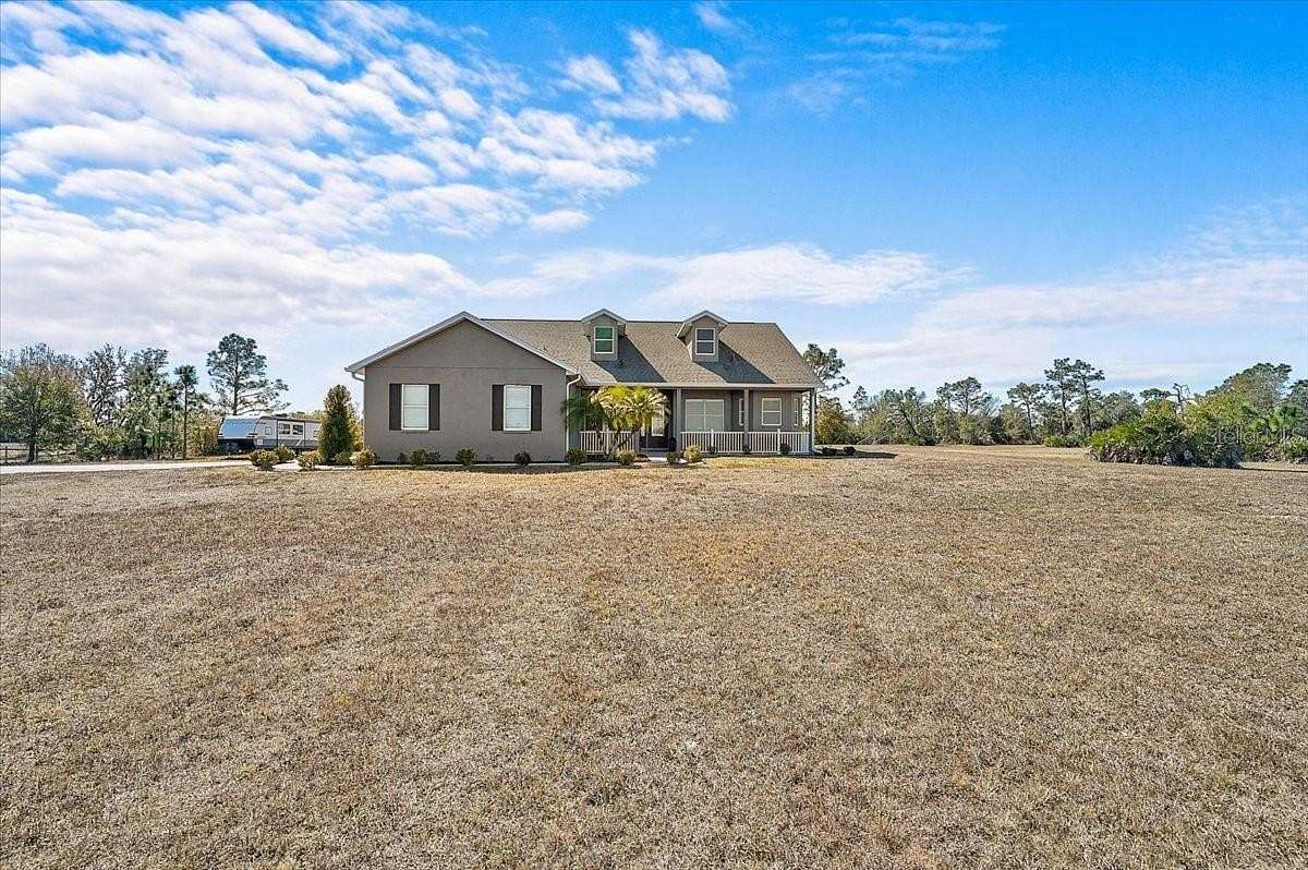 5.39 Acres of Residential Land with Home for Sale in Myakka City, Florida