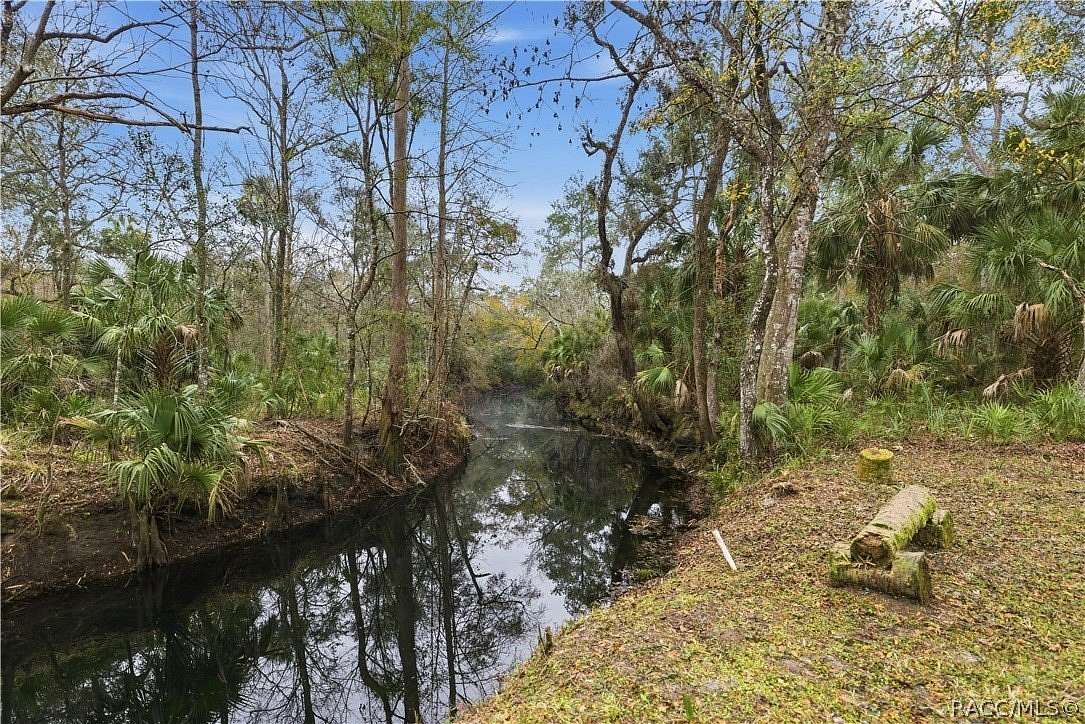5 Acres of Residential Land with Home for Sale in Inglis, Florida