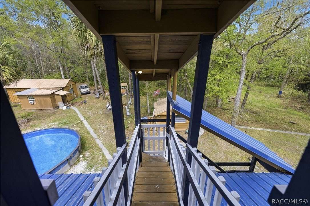 5 Acres of Land with Home for Sale in Inglis, Florida