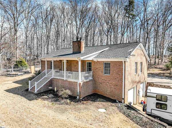 6.9 Acres of Residential Land with Home for Sale in Woodruff, South Carolina