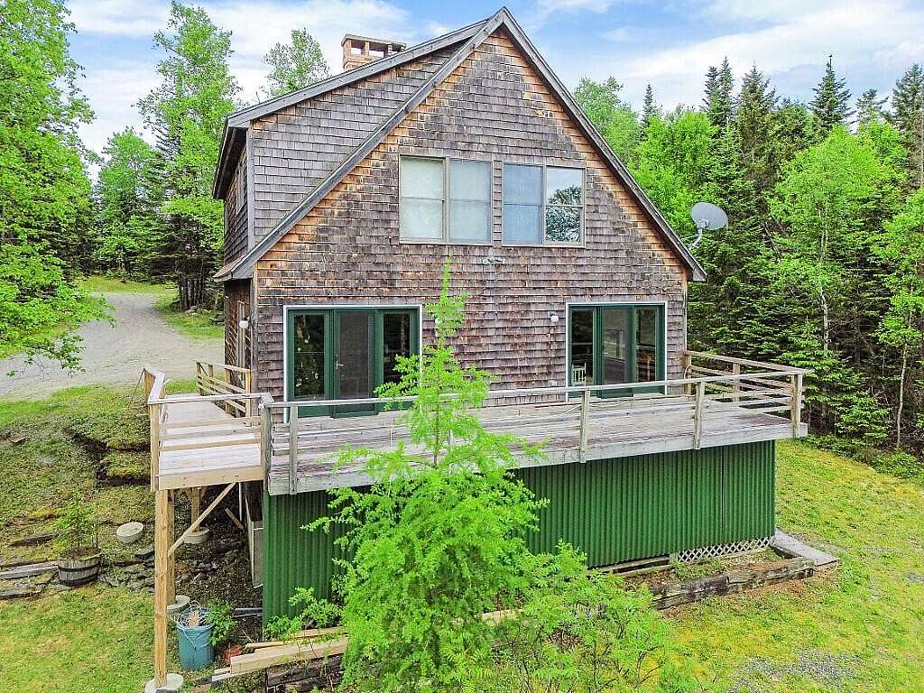 5.46 Acres of Land with Home for Sale in Rangeley, Maine