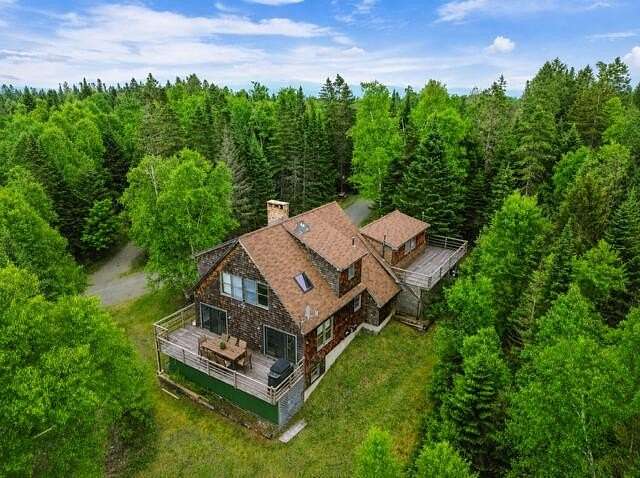 5.46 Acres of Land with Home for Sale in Rangeley, Maine