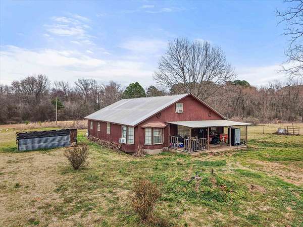9.7 Acres of Land with Home for Sale in Gilmer, Texas