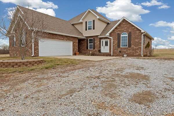 10 Acres of Land with Home for Sale in Aurora, Missouri