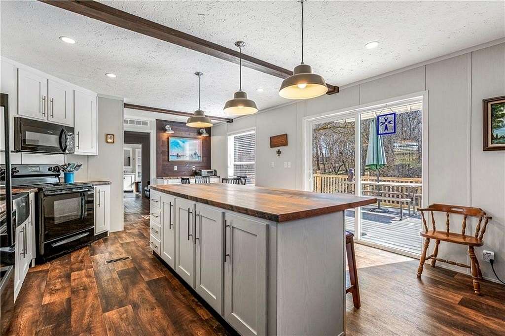 4.75 Acres of Land with Home for Sale in Prairie Grove, Arkansas