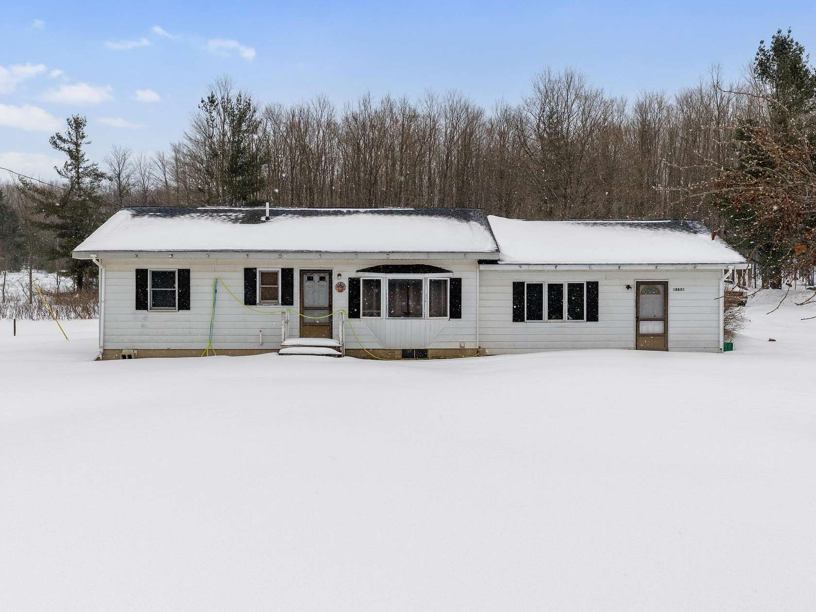 3.5 Acres of Residential Land with Home for Sale in Atlanta, Michigan