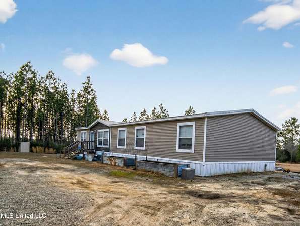 10 Acres of Land with Home for Sale in Vancleave, Mississippi