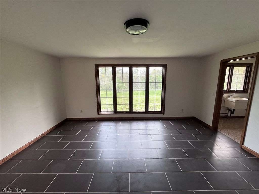 5 Acres of Land with Home for Sale in Dover, Ohio