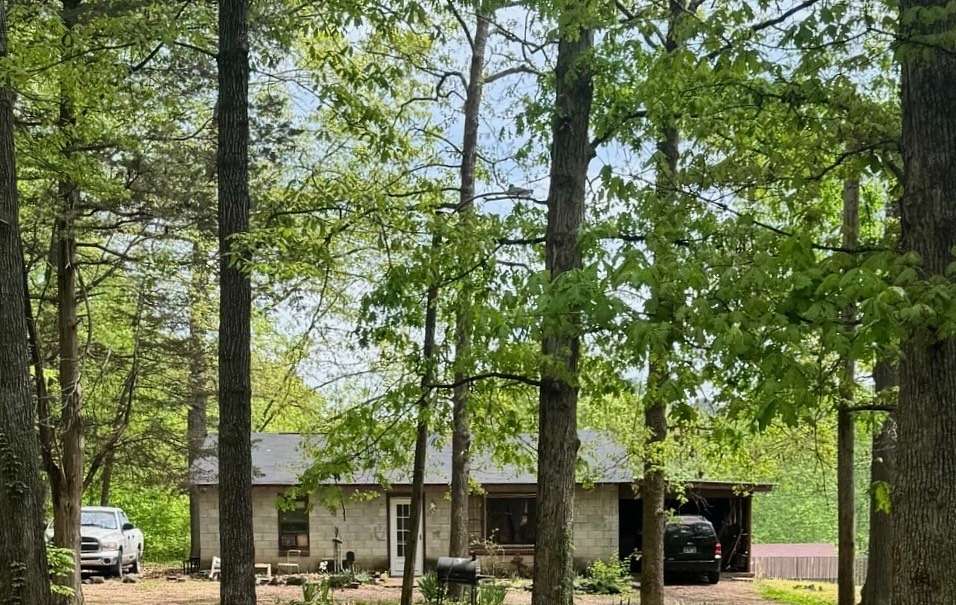 2.57 Acres of Residential Land with Home for Sale in Camden, Tennessee