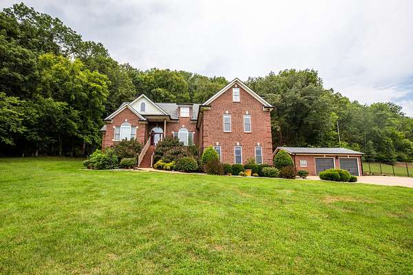 5.87 Acres of Residential Land with Home for Sale in Whites Creek, Tennessee