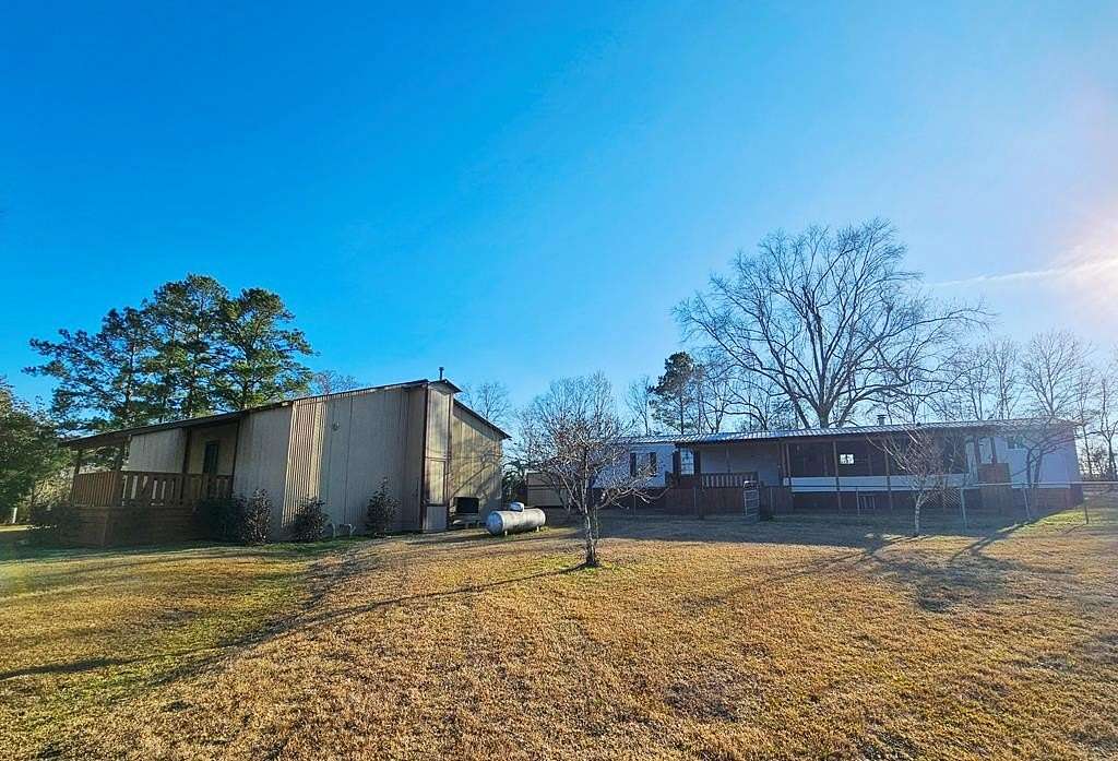 6.8 Acres of Residential Land with Home for Sale in Lumberton, Mississippi
