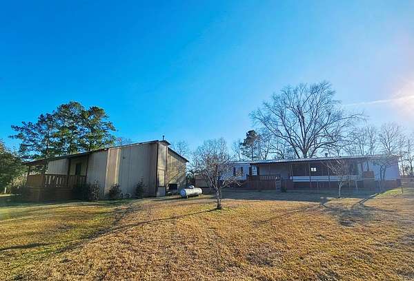 6.8 Acres of Residential Land with Home for Sale in Lumberton, Mississippi