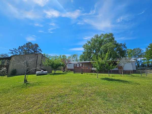6.89 Acres of Land with Home for Sale in Lumberton, Mississippi