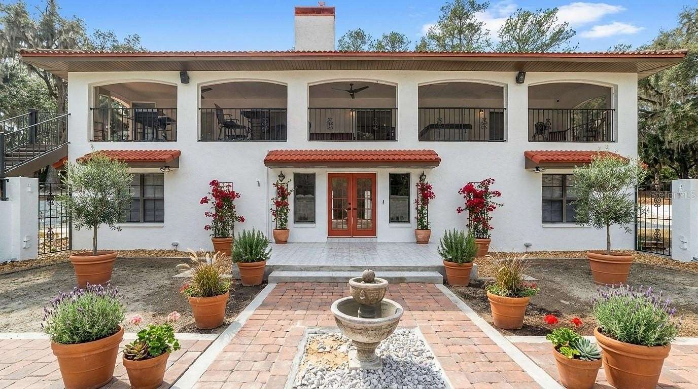 5 Acres of Residential Land with Home for Sale in Micanopy, Florida