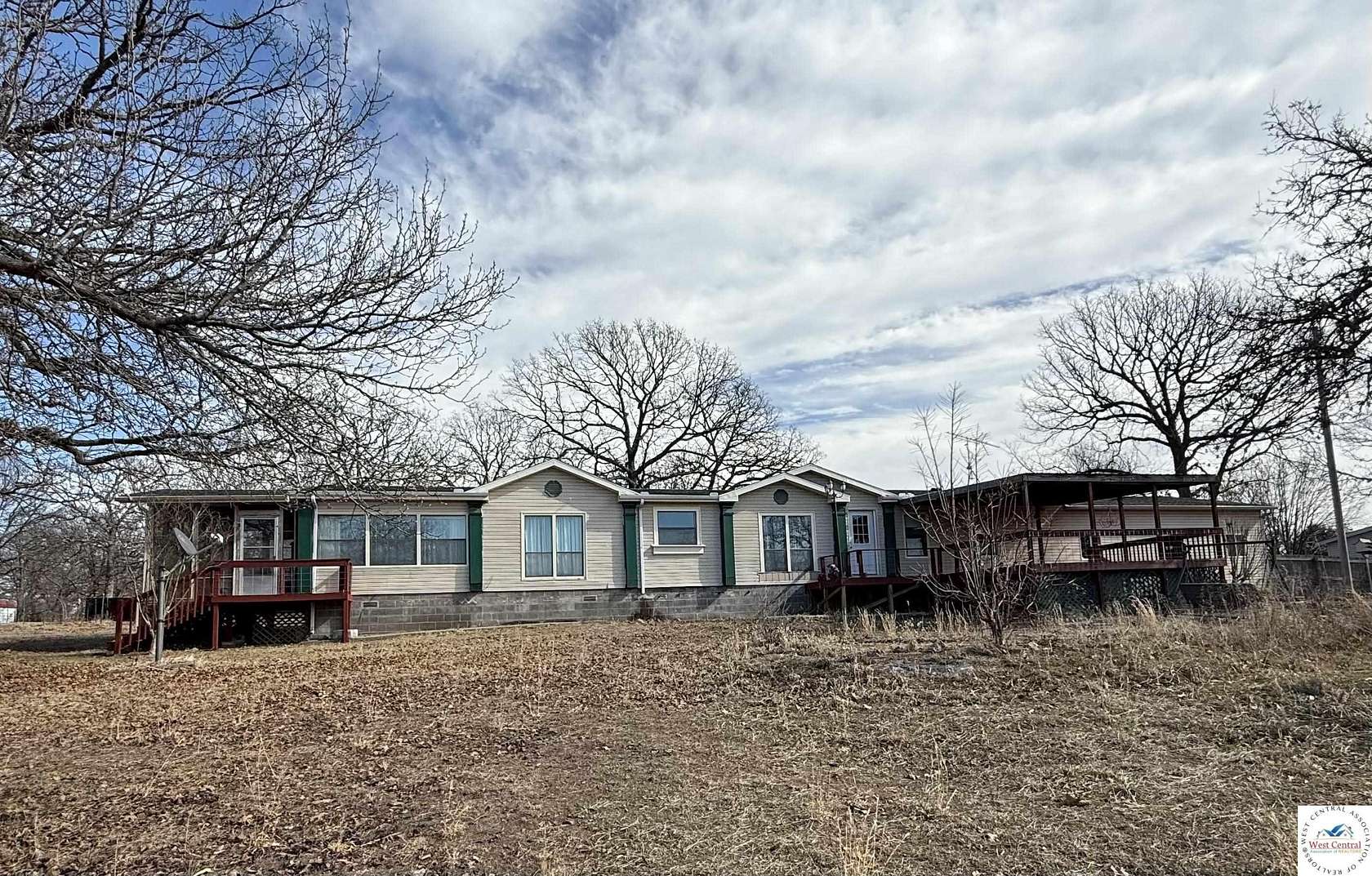 13.5 Acres of Land with Home for Sale in Warsaw, Missouri