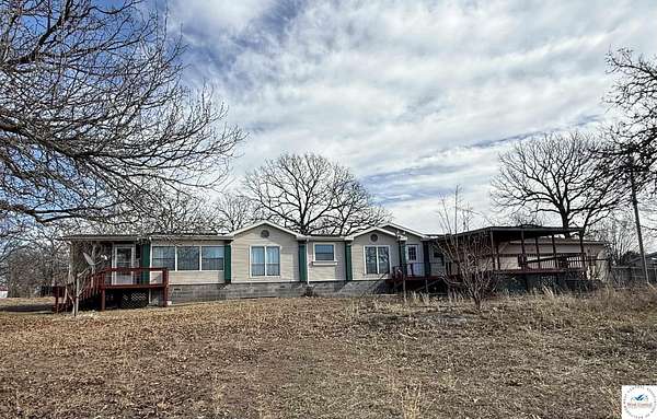 13.5 Acres of Land with Home for Sale in Warsaw, Missouri