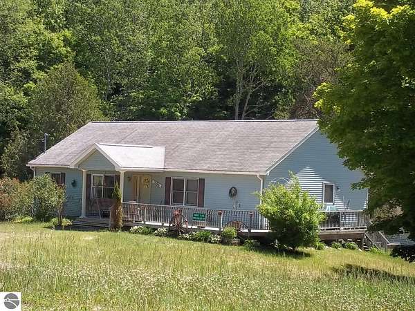 2.64 Acres of Residential Land with Home for Sale in Cedar, Michigan