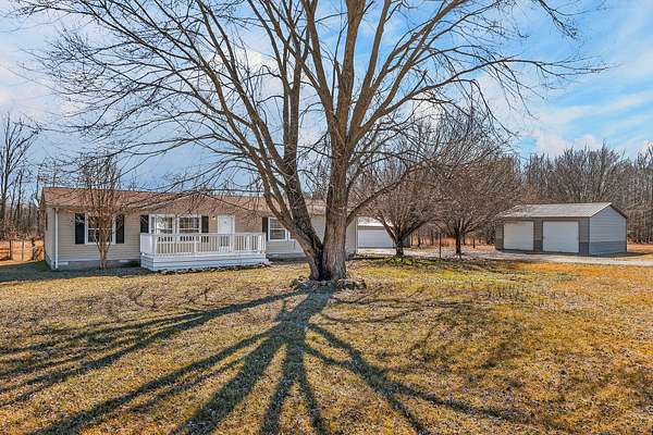 5.83 Acres of Residential Land with Home for Sale in Smithville, Tennessee