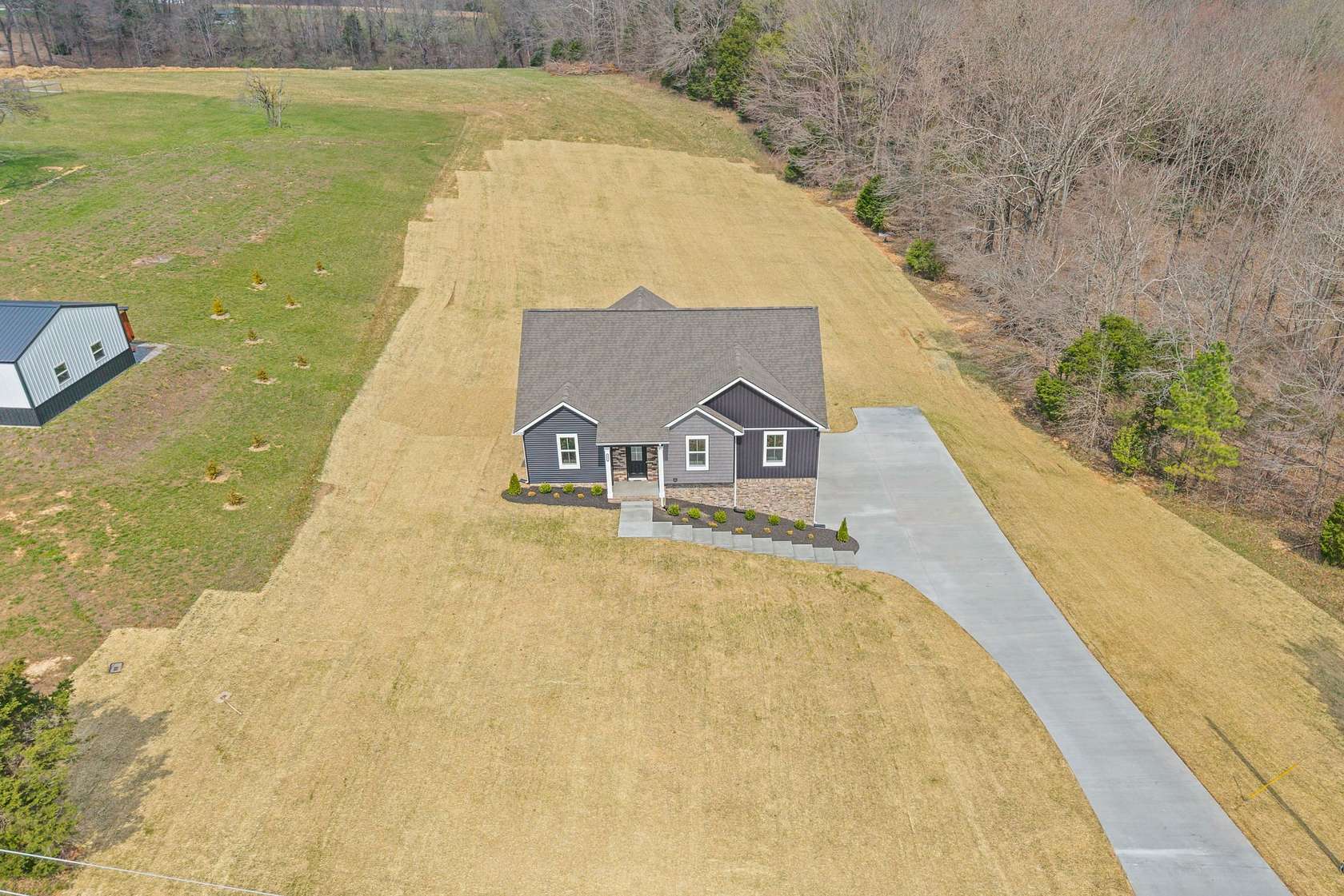 1.57 Acres of Land with Home for Sale in Southside, Tennessee