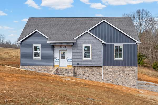 1.57 Acres of Residential Land with Home for Sale in Southside, Tennessee