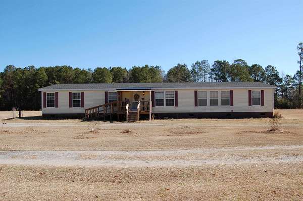 12.8 Acres of Land with Home for Sale in Mullins, South Carolina