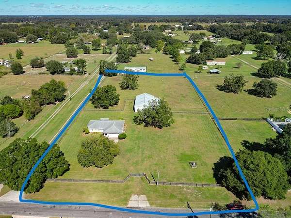 3 Acres of Land with Home for Sale in Summerfield, Florida