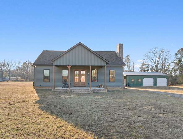 8.32 Acres of Land with Home for Sale in Galivants Ferry, South Carolina