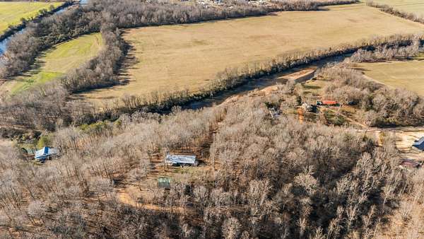 9.26 Acres of Residential Land with Home for Sale in Linden, Tennessee