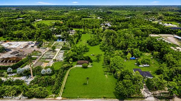 7 Acres of Land with Home for Sale in Loxahatchee Groves, Florida