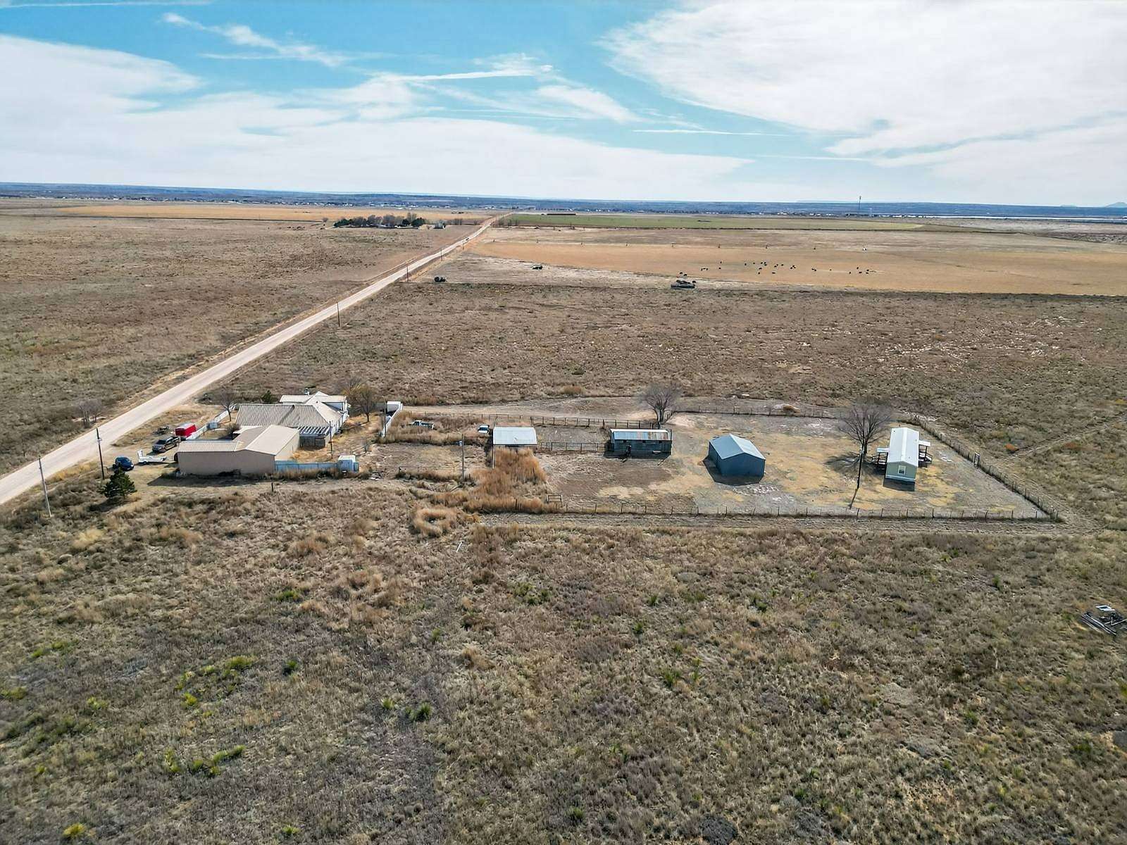 10 Acres of Residential Land with Home for Sale in Logan, New Mexico