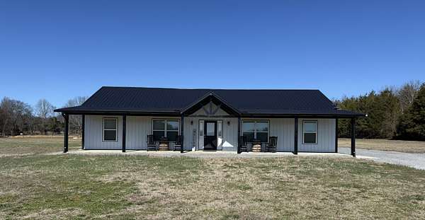 8.1 Acres of Residential Land with Home for Sale in Petersburg, Tennessee