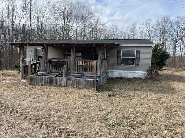 1.56 Acres of Residential Land with Home for Sale in Hohenwald, Tennessee