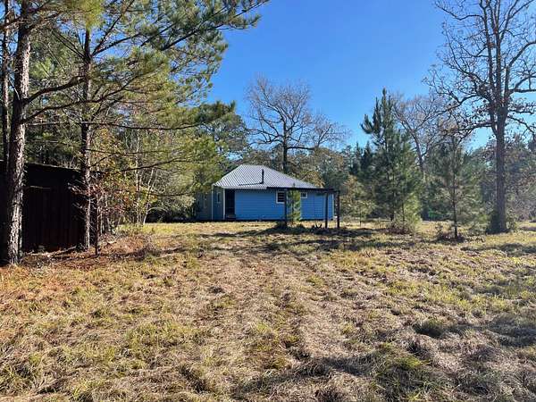 6 Acres of Land with Home for Sale in Camden, Texas