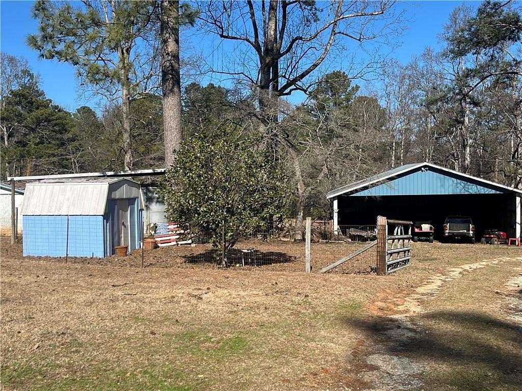 7.7 Acres of Residential Land with Home for Sale in Fairburn, Georgia