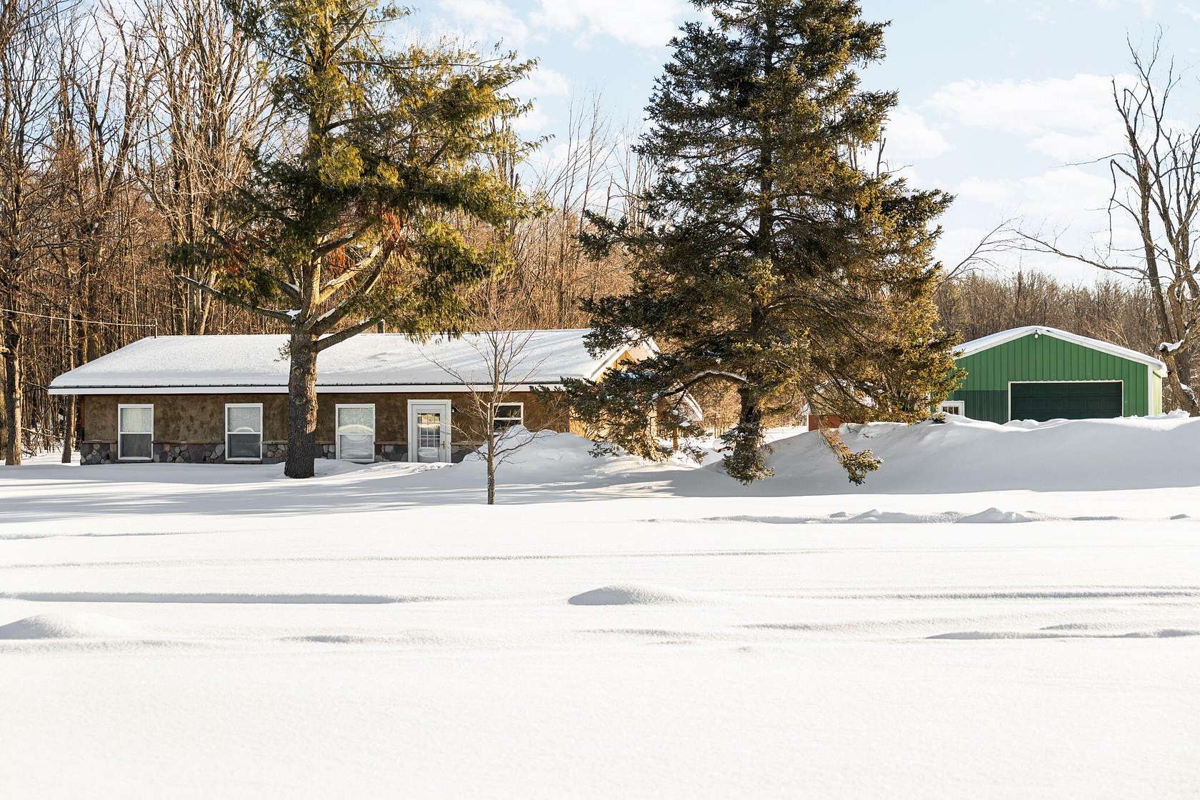 10 Acres of Recreational Land with Home for Sale in Gaylord, Michigan