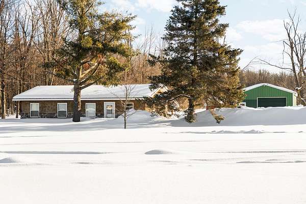 10 Acres of Recreational Land with Home for Sale in Gaylord, Michigan