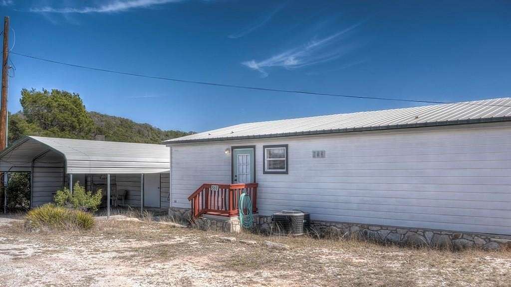 5.2 Acres of Land with Home for Sale in Camp Wood, Texas