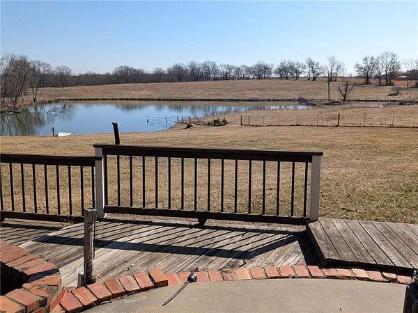 29.9 Acres of Agricultural Land with Home for Sale in Belton, Missouri