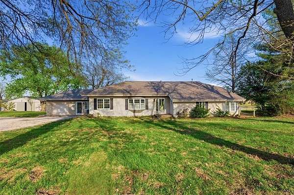 5 Acres of Land with Home for Sale in Belton, Missouri