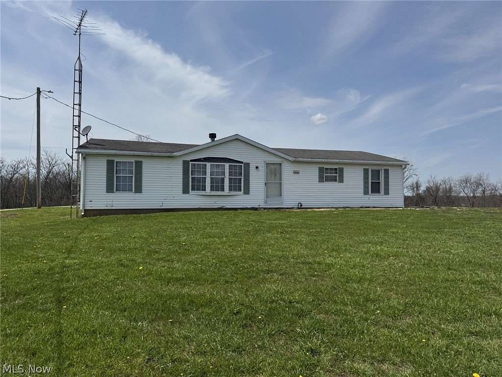 10 Acres of Land with Home for Sale in Carrollton, Ohio