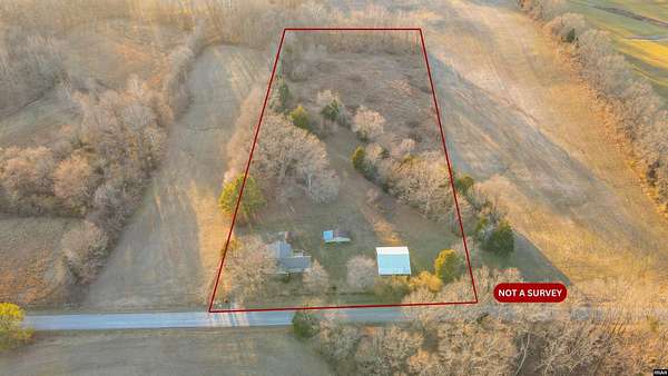 5 Acres of Residential Land with Home for Sale in Martin, Tennessee