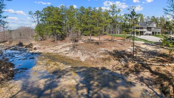 5.13 Acres of Residential Land with Home for Sale in Brookeland, Texas