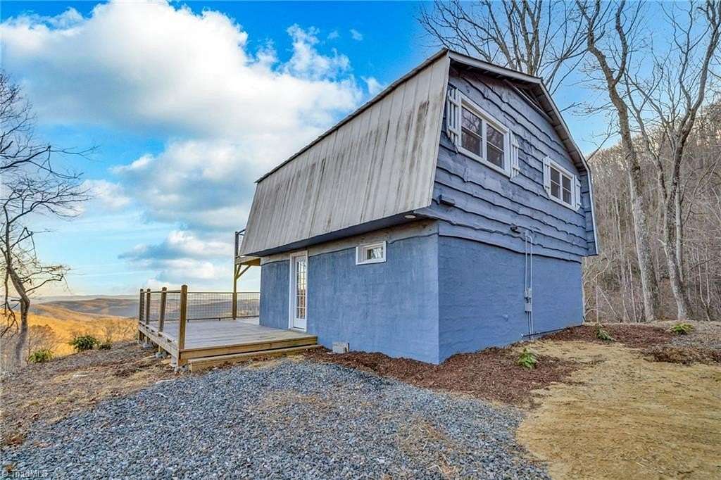 21 Acres of Recreational & Residential Land for Sale in Laurel Springs, North Carolina