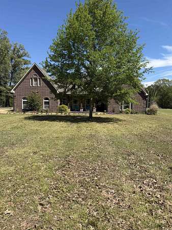 12.8 Acres of Land with Home for Sale in Palestine, Arkansas