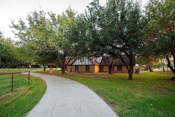 5 Acres of Residential Land with Home for Sale in Decatur, Texas