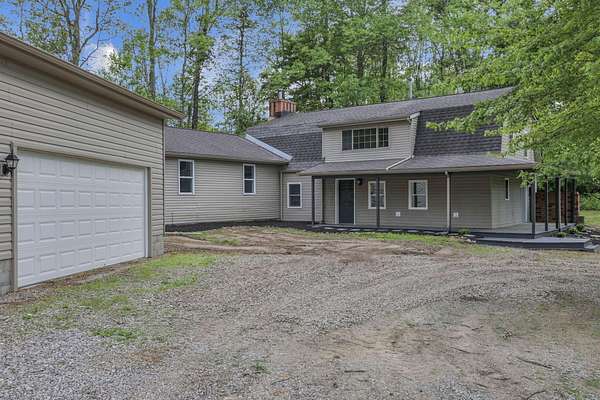 5.56 Acres of Land with Home for Sale in Nashport, Ohio