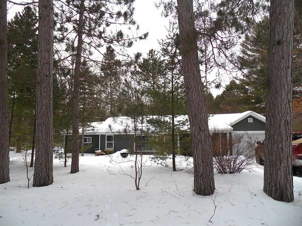 5 Acres of Residential Land with Home for Sale in Roscommon, Michigan