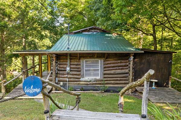 4.44 Acres of Residential Land with Home for Sale in Sevierville, Tennessee